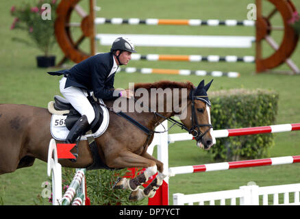 Nov 30, 2006; Wellington, FL, USA; Henrik Gundersen jumps Complete during $15,000 National Speed Classic at the 123rd National Horse Show and Family Festival in Wellington Thursday afternoon.  Mandatory Credit: Photo by Taylor Jones/Palm Beach Post/ZUMA Press. (©) Copyright 2006 by Palm Beach Post Stock Photo