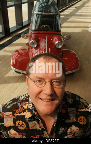 Mar 02, 2006 - Emeryville, California, USA - JOHN LASSETER, 49, writer/director of the animated motion picture 'Cars,' poses in his Pixar office with toys based on characters from the upcoming film. Lasseter is the co-founder of Pixar. (Credit Image: © Martin Klimek/ZUMA Press) Stock Photo