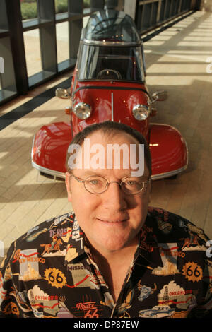 Mar 02, 2006 - Emeryville, California, USA - JOHN LASSETER, 49, writer/director of the animated motion picture 'Cars,' poses in his Pixar office with toys based on characters from the upcoming film. Lasseter is the co-founder of Pixar. (Credit Image: © Martin Klimek/ZUMA Press) Stock Photo