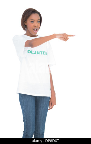 Surprised woman pointing at something Stock Photo