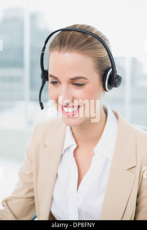 Smiling pretty agent dealing with customer Stock Photo