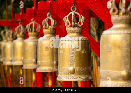 Bells in a buddhist temple of Thailand Stock Photo
