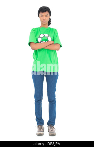 Frowning black haired ecologist posing with crossed arms Stock Photo