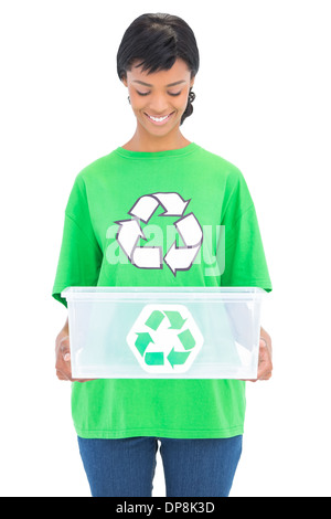 Delighted black haired ecologist holding a recycling box Stock Photo