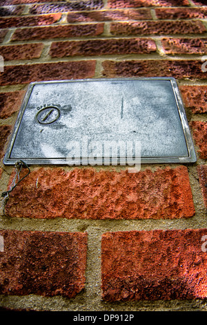 Exterior chimney flue inspection hatch Stock Photo