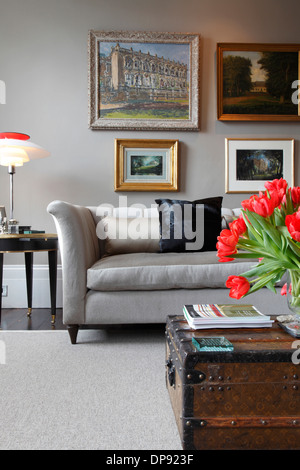 Scandinavian Interior Sitting Room With Grey Walls And Couch Stock