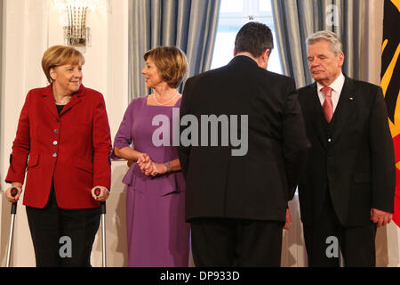 Berlin, Germany. 9th Jan, 2014. German Chancellor Angela Merkel (1st L), Vice-Chancellor and Minister of Economics and Energy Sigmar Gabriel (2nd R) and German President Joachim Gauck (1st R) attend the New Year reception at the Presidential Palace in Berlin, Germany, on Jan. 9, 2013. © Zhang Fan/Xinhua/Alamy Live News Stock Photo