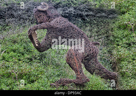 Stackpole Wicker Statue Wicker statue of horned man with pan flutes outside Museum of ...