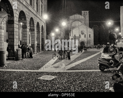 Night life around Palazzo Isolani in Bologna where students hang out at all hours of the night. Stock Photo