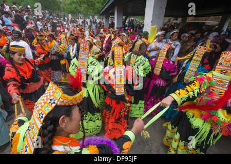 Kalash women and girls dancing wildly at the Anish Brun Village Charso (dancing ground), Kalash Joshi (Spring Festival), Bumburet Valley, Chitral, Khyber-Pakhtunkhwa, Pakistan Stock Photo