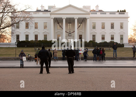 Tourists visit the White House, Washington DC, 17 December, 2013. photo by Trevor Collens. Stock Photo