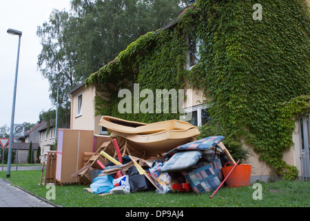 Rubbish piled up in front of house awaiting collection Stock Photo