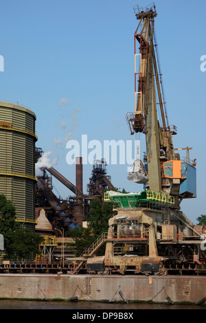 Dock crane at steelworks of ArcelorMittal Gent, world's largest steel producer, port of Ghent, East Flanders, Belgium Stock Photo