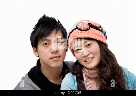 Portrait of young couple over white background Stock Photo