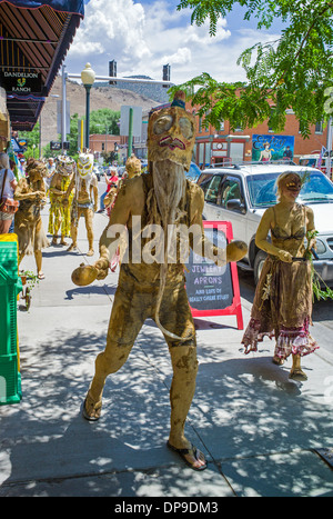 The Mud People dance & play during ArtWalk, an annual art event in the small mountain town of Salida, Colorado, USA Stock Photo