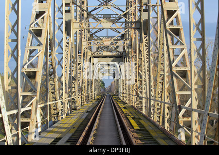 Abandoned railroad bridge over the river Stock Photo