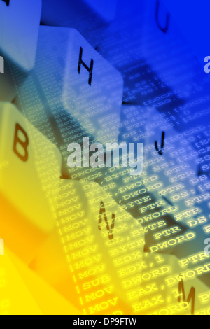 Assembler computer program source code overlay on keyboard close up Stock Photo
