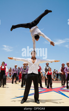 Circus performing near beach in Las Palmas, Gran Canaria, Spain Stock Photo