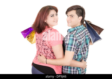 couple with shopping bags in variety of colors. Stock Photo