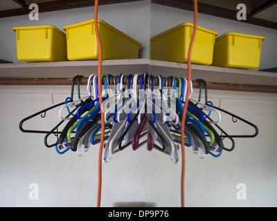 Norfolk, Massachussets, USA. 7th May, 2013. Empty hangers on rod and plastic baskets on shelf, inside a foreclosed home in Norfolk, Massachussets, United States © David H. Wells/ZUMAPRESS.com/Alamy Live News Stock Photo