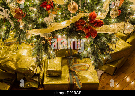 Christmas presents under the tree Stock Photo