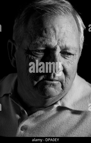 Old man face close up black and white portrait, sad Stock Photo