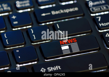 concept news icon on enter key of keyboard Stock Photo