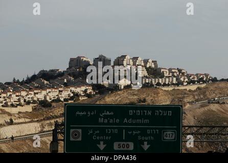 Jerusalem. 10th Jan, 2014. A general view of the West Bank Jewish settlement of Ma'ale Adumim is seen near Jerusalem, on Jan. 3, 2014. The Israeli Housing Ministry published on Friday tenders for the construction of 1,400 housing units in the settlements in the West Bank and east Jerusalem. © Muammar Awad/Xinhua/Alamy Live News Stock Photo