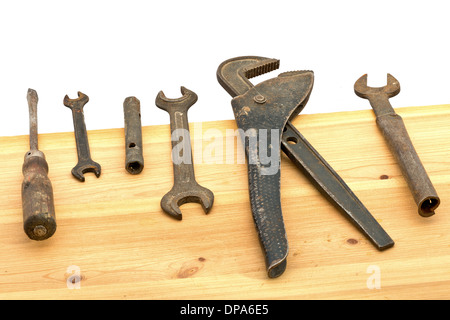 old used tools on the wooden desk Stock Photo