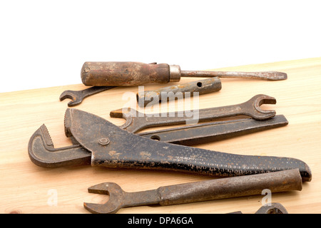old used tools on the wooden desk Stock Photo