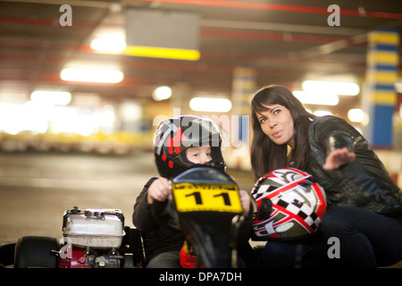 Mother and son at go cart track Stock Photo