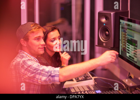 Young adults in college recording studio Stock Photo