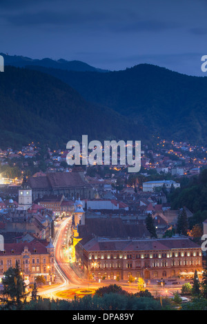 View of Brasov at dusk, Transylvania, Romania Stock Photo