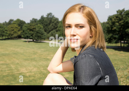 Young woman in park Stock Photo