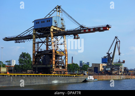 Dock cranes at the steelworks of ArcelorMittal Gent, world's largest steel producer, port of Ghent, East Flanders, Belgium Stock Photo