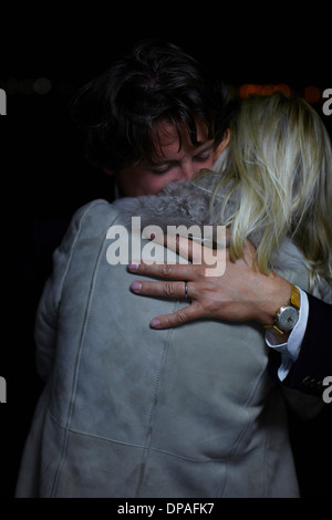 Mature couple comforting each other at night Stock Photo