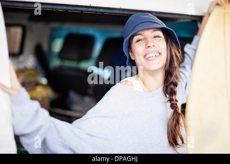 Portrait of young woman wearing beanie hat Stock Photo