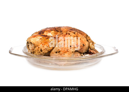 Roast chicken in glass plate isolated on white Stock Photo