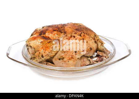 Roast chicken in glass plate isolated on white Stock Photo