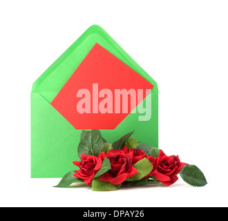 Envelope with floral decor. Flowers are artificial. Stock Photo