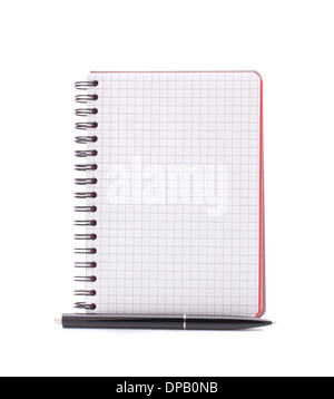Open blank checked notebook with black pen isolated on white background cutout Stock Photo