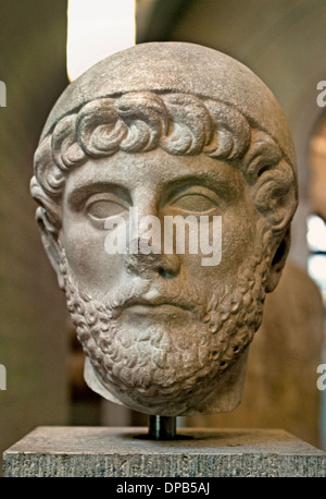 Roman marble portrait head of a man wearing a priest's cap (galerus), dating to the Hadrianic period (circa 120 AD), Glyptothek in Munich. Stock Photo