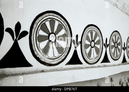 Street art in Udaipur in Rajasthan in India in South Asia. Wheel Chakra Mandala Buddhism Buddhist Symbol Symbolism Religion Religious Abstract Stock Photo