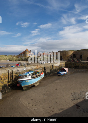 Fishing boats in Beadnell Bay harbour, Northumberland, England. Stock Photo