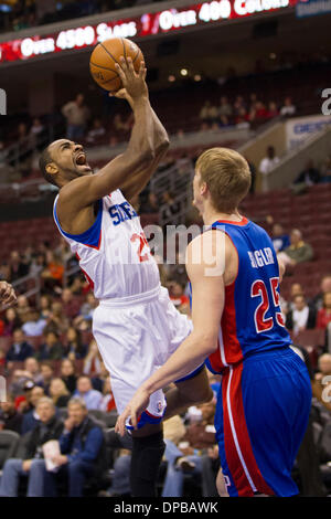 Philadelphia, Pennsylvania, USA. 10th Jan, 2014. Philadelphia 76ers shooting guard Elliot Williams (25) shots the ball with Detroit Pistons small forward Kyle Singler (25) guarding him during the NBA game between the Detroit Pistons and the Philadelphia 76ers at the Wells Fargo Center in Philadelphia, Pennsylvania. The Pistons won 114-104. Christopher Szagola/Cal Sport Media/Alamy Live News Stock Photo