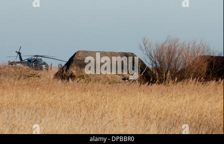 Cley, Norfolk, UK. 11th January 2014. USAF HH-60G Pave Hawk helicopter at  site on the North Norfolk coast at Cley where another crashed leaving four US airmen dead Credit:  Tim James/The Gray Gallery/Alamy Live News Stock Photo