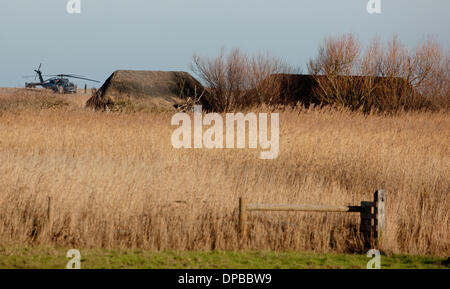 Cley, Norfolk, UK. 11th January 2014. USAF HH-60G Pave Hawk helicopter at  site on the North Norfolk coast at Cley where another crashed leaving four US airmen dead Credit:  Tim James/The Gray Gallery/Alamy Live News Stock Photo