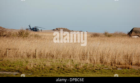 Cley, Norfolk, UK. 11th January 2014. USAF HH-60G Pave Hawk helicopter at  site on the North Norfolk coast at Cley where another crashed leaving four US airmen dead Credit:  Tim James/The Gray Gallery/Alamy Live News Stock Photo