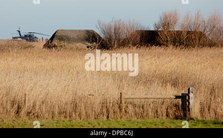 Cley, Norfolk, UK. 11th January 2014. USAF HH-60G Pave Hawk helicopter at  site on the North Norfolk coast at Cley where another crashed leaving four US airmen dead Credit:  Tim James/The Gray Gallery/Alamy Live News Stock Photo