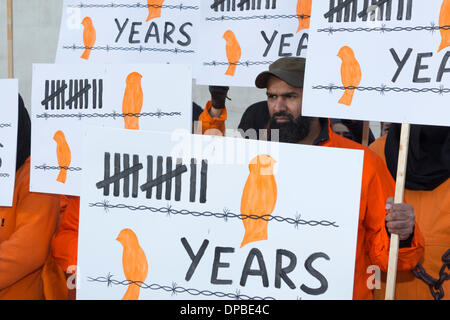 London, UK. 11th January 2014. A protest to mark the 12th anniversary of the opening of the Guantanamo Bay prison camp coincided with the Free Shaker Aamer Campaign in London's Trafalgar Square. The demonstration organised by the London Guantánamo Campaign called for the closure of the camp and justice for the prisoners. Shaker Aamer is the last British resident to be imprisoned at the camp and the campaigners called for his release. Photo: Nick Savage/Alamy Live News Stock Photo